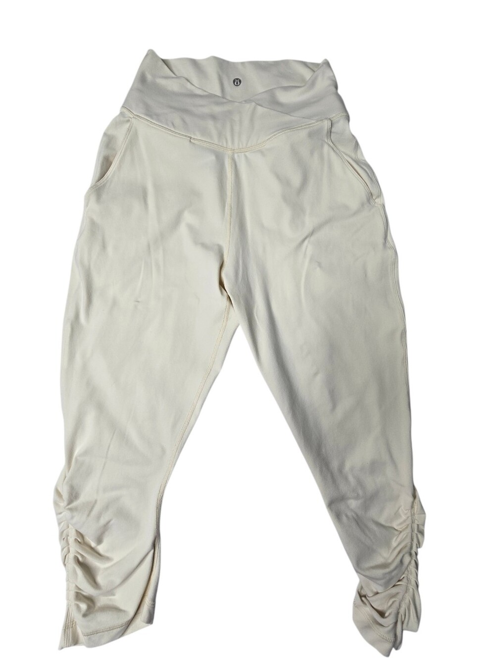 lululemon Athletica Sunset Salutation Crop leggings in a light beige or cream